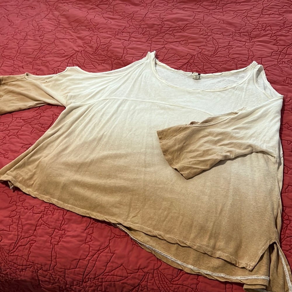 Free People cold shoulder raw edge top.  Size medium